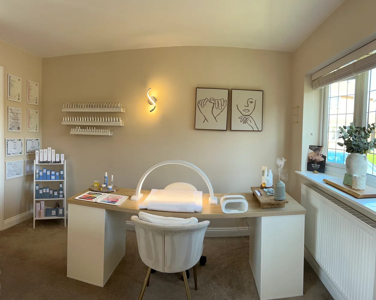 Calm beauty treatment room setup with nail station in Portishead salon